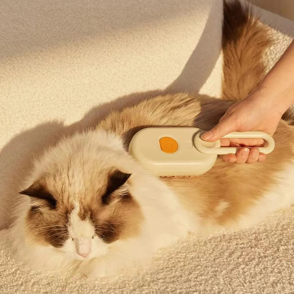 MUO Studios rechargeable pet spray brush being used to groom a fluffy white and brown cat on a beige carpet